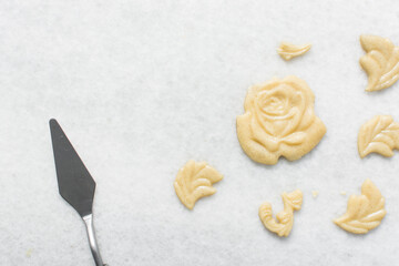 top view of stamped sugar cookie dough, process of making vanilla sugar cookies