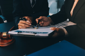 Judge gavel with Justice lawyers, Business woam in suit or lawyer working on a documents. Legal law, advice and justice concept..