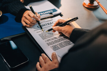 Judge gavel with Justice lawyers, Business woam in suit or lawyer working on a documents. Legal law, advice and justice concept..