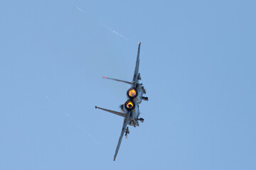 Tail view of a F-15 Eagle with afterburners on