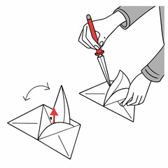 Hands using a tool to fold paper into a shape