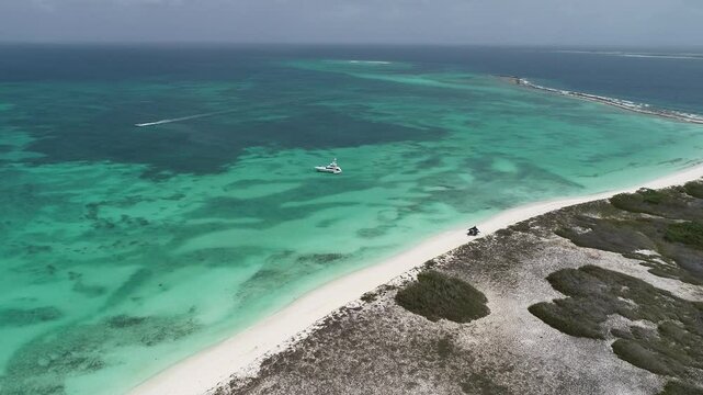 Los Roques Skyline In Los Roques Caracas Venezuela. Turquoise Ocean Waves Gently Crashing On Tropical Beach. Shore Horizon Beach Sea. Shore Panorama. Los Roques Caracas.