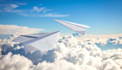 Fototapeta premium Two paper airplanes soar through a bright sky filled with clouds, symbolizing freedom and imagination
