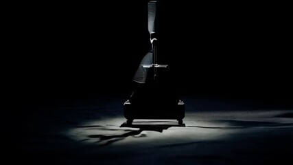 Vintage Motorized Kinetic Art Sculpture Rotating in Dark Setting with Soft Lighting, Dynamic Movement and Shadow - Powered by Adobe