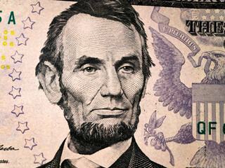 Abraham Lincoln on a five-dollar buck