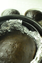 brown chocolate cake bake on aluminum foil paper