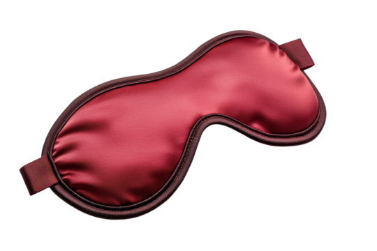 Red silk eye mask with a brown strap isolated