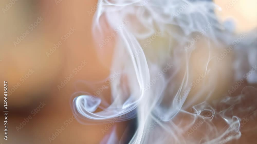 Poster wispy white smoke curls and flows on a hazy tan background, creating abstract shapes and an ethereal