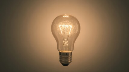 Illuminated Glass Light Bulb A Symbol of Ideas and Innovation