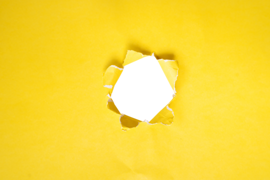 yellow paper with a transparent hole in the middle