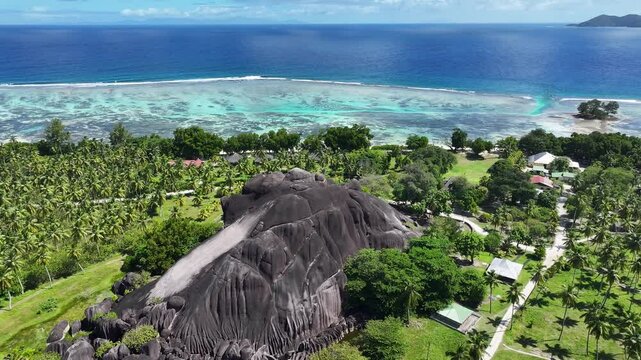 Seychelles Skyline In La Digue Island Victoria Seychelles. Turquoise Ocean Waves Gently Crashing On Tropical Beach. Island Life Landscape Recreation Wanderlust. Summertime Recreation Coast.