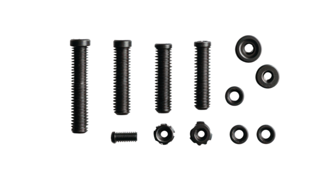 Various black metal bolts and nuts, white isolate background