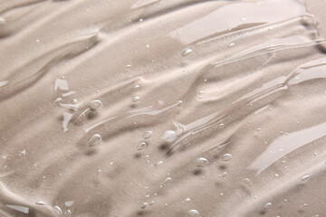 Texture of shower gel on color background, closeup