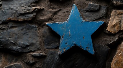 Blue star on stone wall.