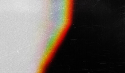 Designed film texture background with heavy grain, dust and a light leak Real Lens Flare Shot in Studio over Black Background. Easy to add as Overlay or Screen Filter over Photos overlay