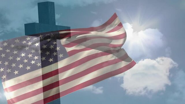 American flag emerging and billowing around wooden cross under sunlit clouds showing patriotism