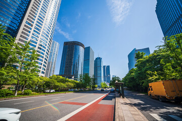 A Vibrant Cityscape: Modern Architecture Meets Lush Greenery