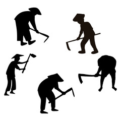 Silhouette of a farmer working in the field with a hoe