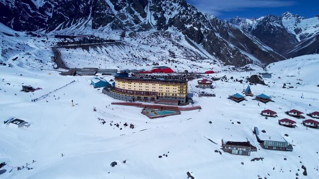 Portillo Ski Center In Andes Mountains Valparaiso Chile. Skier Skiing Downhill On Empty Ski Slopes In The Mountains. Outdoor Travel Destinations Andes Glacier. Outdoor Andes Above View.