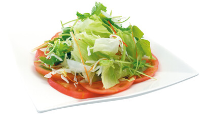 Fresh Tomato and Mixed Greens Salad on White Plate