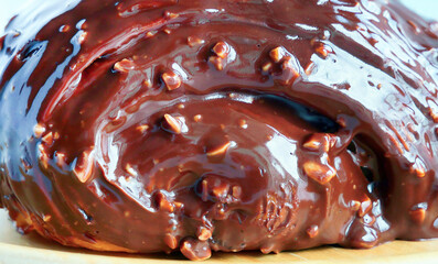 Close up Chocolate coated croissant with fudge chunks, Fresh baked made of croissant dough, sweet bakery pastry, specialty menu