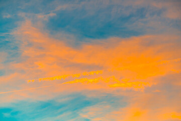 Fototapeta premium Blue sunset sky with white clouds