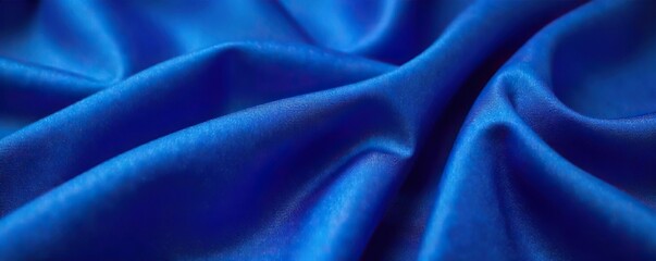 Obraz premium Close-up of a sharply creased royal blue fabric, luxurious texture, elegant folds, implying wealth and sophistication , high-class, dress