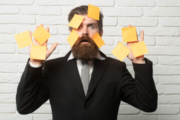 Busy businessman under deadline. Busy deadline concept. Busy employee facing urgent tasks. Stressed but determined. Startup deadline chaos. Busy worker. Deadline panic.