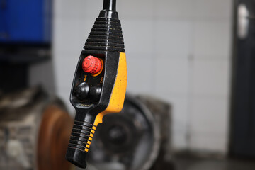 Close up remote control switch for overhead crane only two up and down buttons and one red...