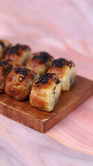 Jakarta's signature baked Bolen cake photographed at various angles of 45 degrees, front view and flat lay. isolate object