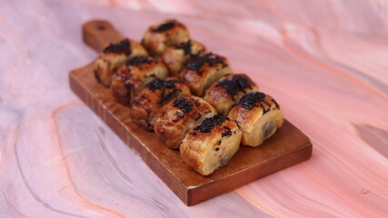 Jakarta's signature baked Bolen cake photographed at various angles of 45 degrees, front view and...