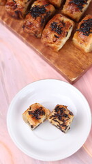 Jakarta's signature baked Bolen cake photographed at various angles of 45 degrees, front view and...