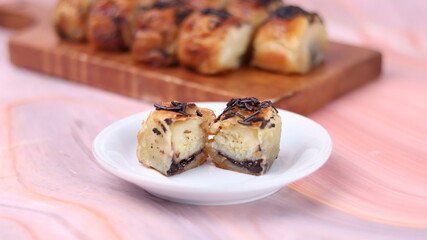 Jakarta's signature baked Bolen cake photographed at various angles of 45 degrees, front view and flat lay. isolate object
