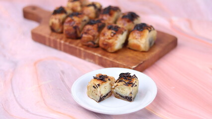 Jakarta's signature baked Bolen cake photographed at various angles of 45 degrees, front view and flat lay. isolate object