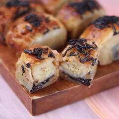 Jakarta's signature baked Bolen cake photographed at various angles of 45 degrees, front view and...