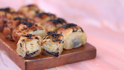 Jakarta's signature baked Bolen cake photographed at various angles of 45 degrees, front view and...
