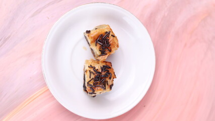 Jakarta's signature baked Bolen cake photographed at various angles of 45 degrees, front view and...
