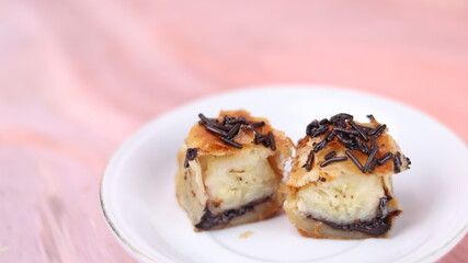 Jakarta's signature baked Bolen cake photographed at various angles of 45 degrees, front view and...