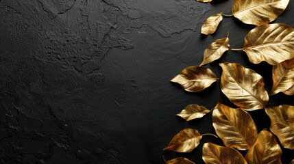 Gold leaf accents on a black background, creating an elegant contrast.