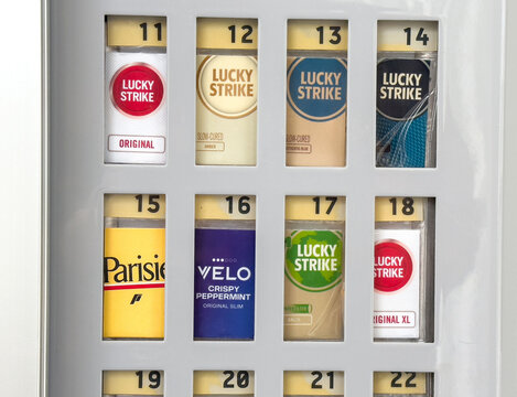 Cigarette vending machine display: lucky strike, parisienne, velo peppermint