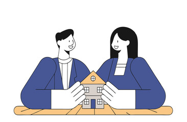young couple in front of house