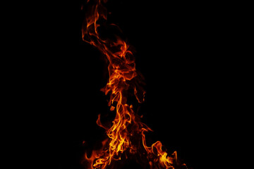 Burning flames against a dark background