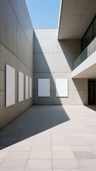 Fototapeta premium Modern Concrete Building with Blank Canvas Panels