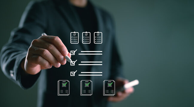 Quality control checklist concept with inspector marking virtual QA QC task list. Suitable for manufacturing, inspection, audit, production process, and compliance documentation themes.