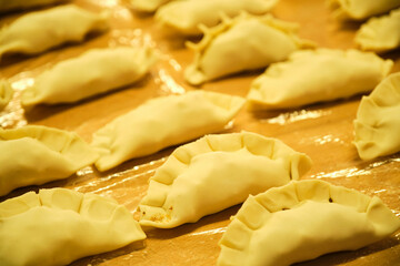 Argentinean Empanadas ready to bake in the oven, traditional food from Argentina.