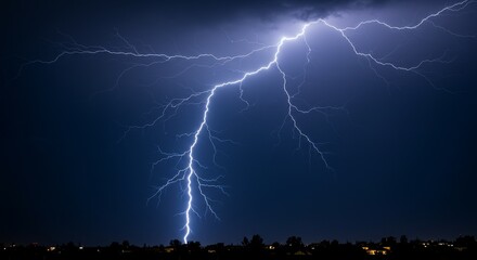 Photo of Lightning Strike Over City at Night
