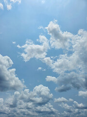 Summer or rainy season blue sky cloud gradient light white background. Beauty clear cloudy in sunshine. Blue sky and white cloud, fluffy cloudy sky background. Beautiful landscape	