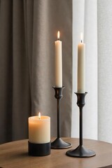 Elegant, minimalist candleholder crafted from sleek, dark metal Perfect for modern interiors, adding a touch of sophistication and warmth Ideal for tabletop or shelf display , metal, luxury
