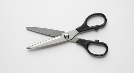 Photo of Pair of Black Handled Scissors on White Background