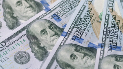 A Beautiful Variety of 100 Dollar Bills Laid Out for Display or Collection Purposes